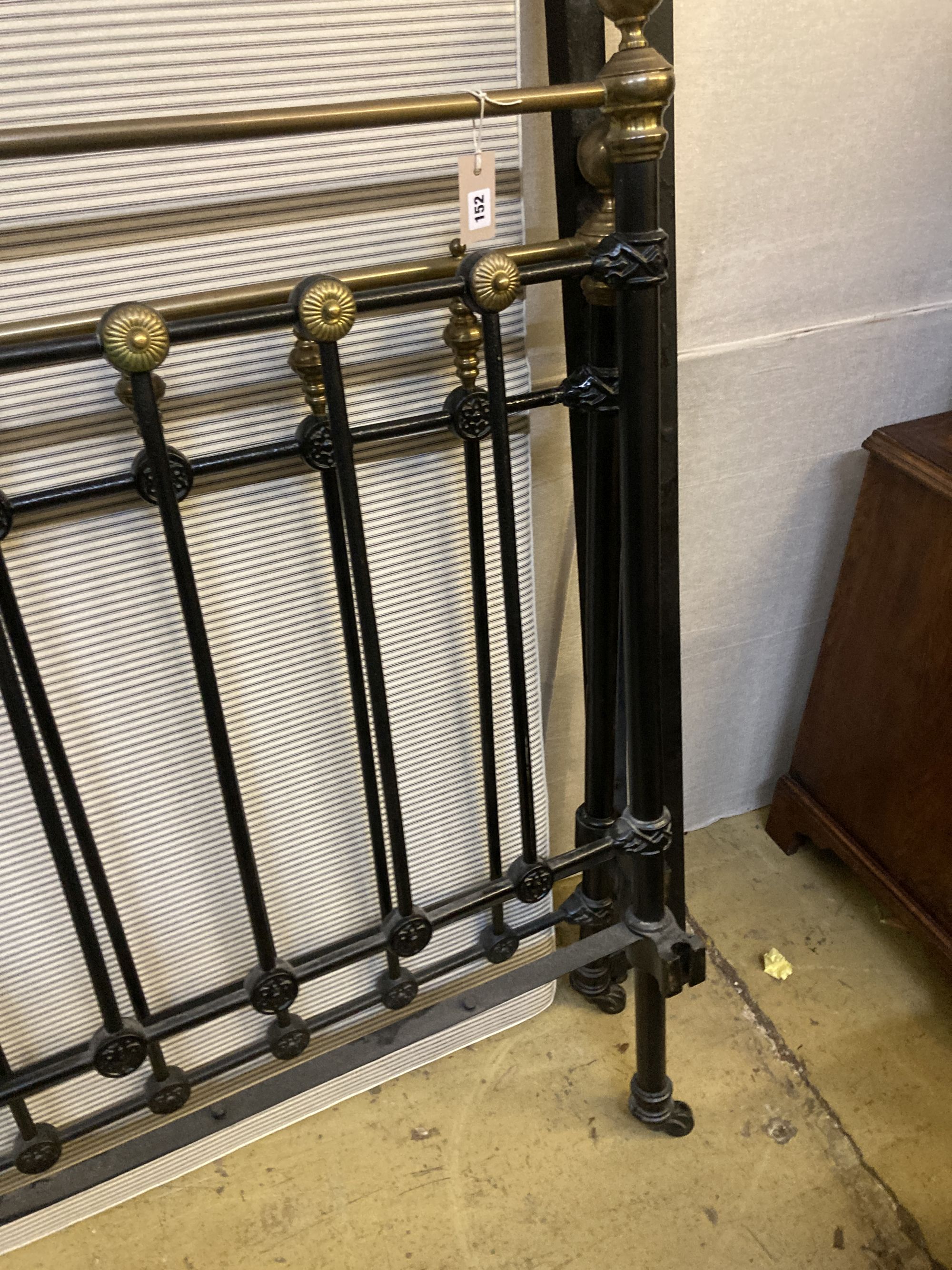 A Victorian style brass and iron double bed frame, width 4ft. 6in., height 140cm